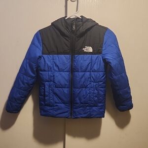 The North Face Kids Black and Blue Puffer Jacket